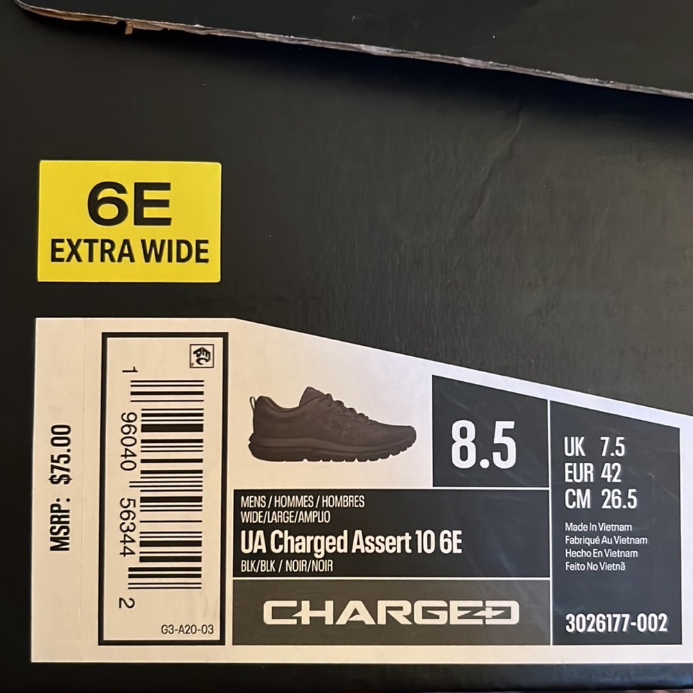 Men’s Under Armour tennis shoes.